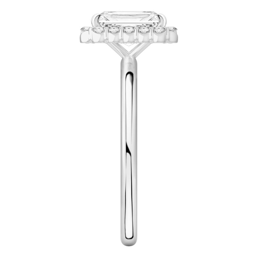 Side view of radiant cut diamond floral halo engagement ring in platinum