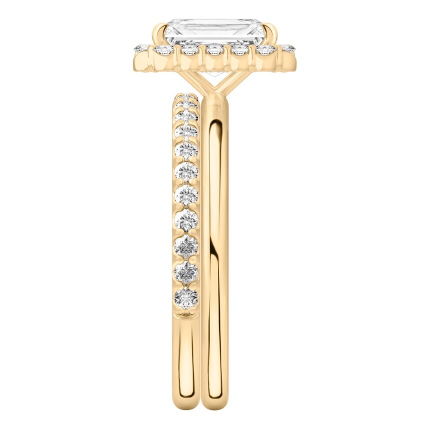 Side view of radiant cut diamond floral halo engagement ring set yellow gold