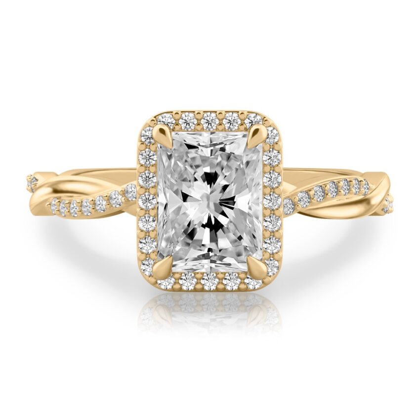 radiant cut diamond twist halo engagement ring in yellow gold