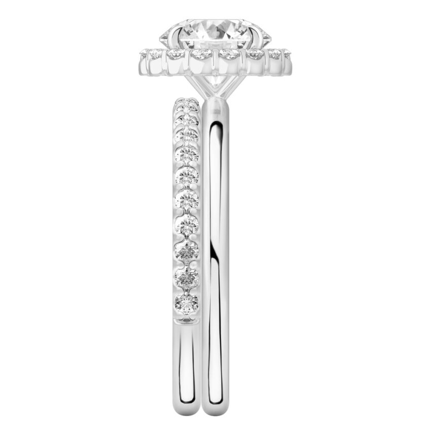 Side view of round cut diamond floral halo engagement ring set platinum