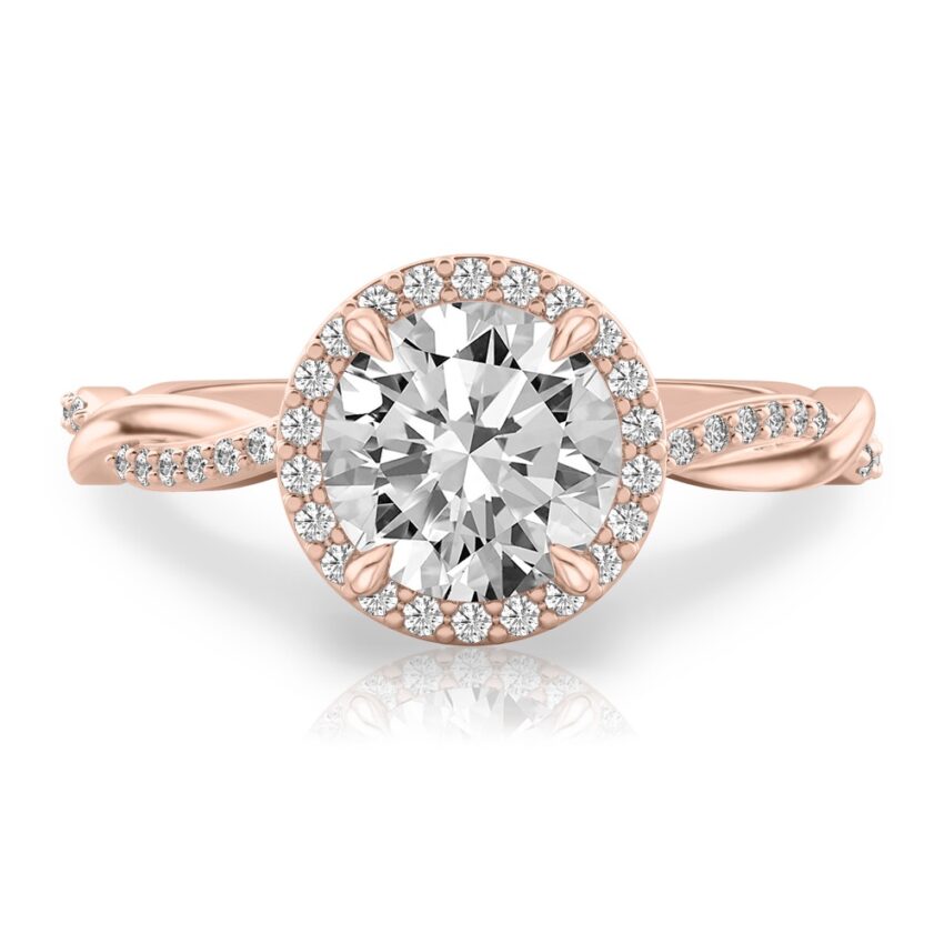 round cut diamond twist halo engagement ring in rose gold