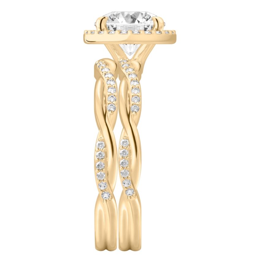 Side view of round cut diamond twist halo engagement ring set yellow gold