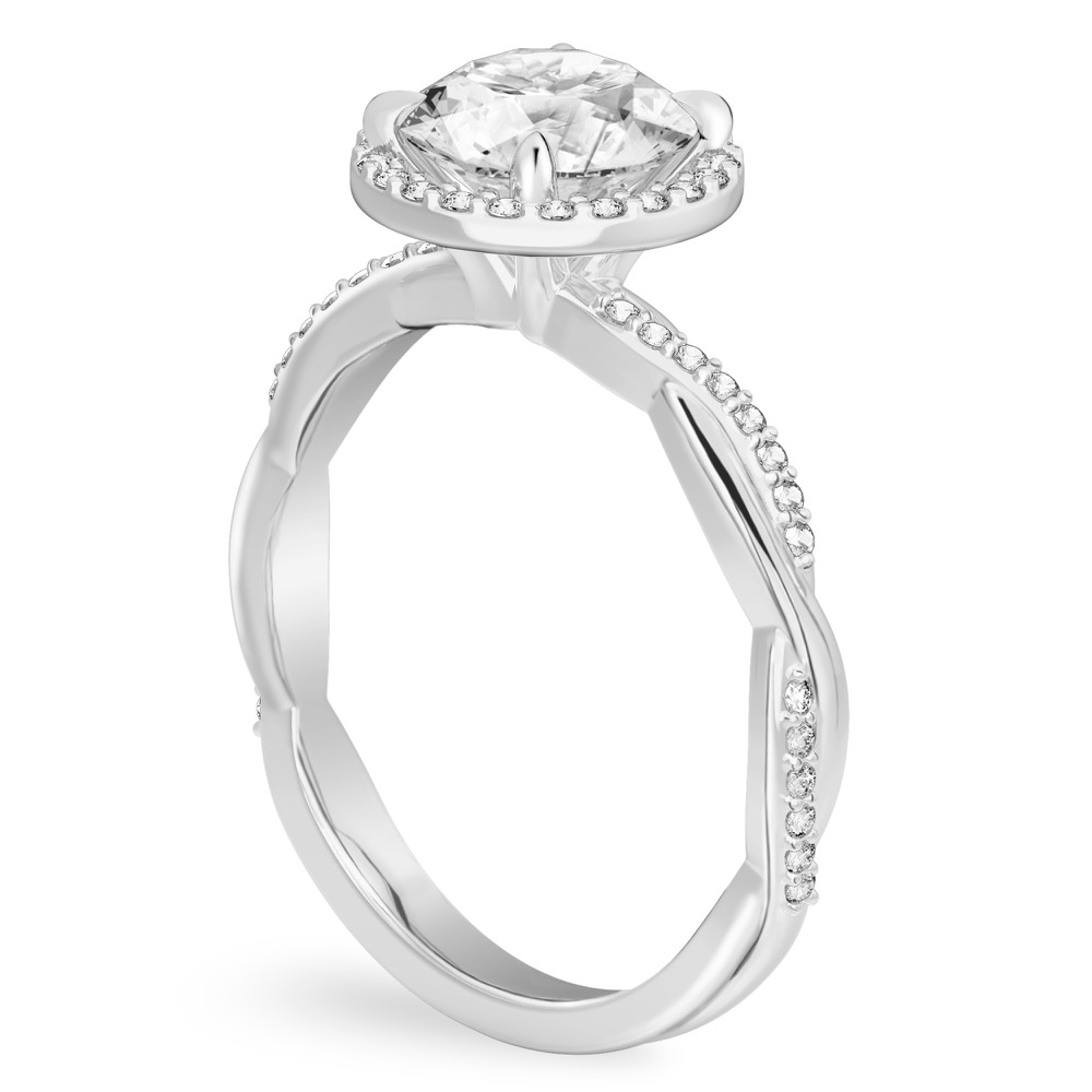 Angle view of round cut diamond twist halo engagement ring in white gold