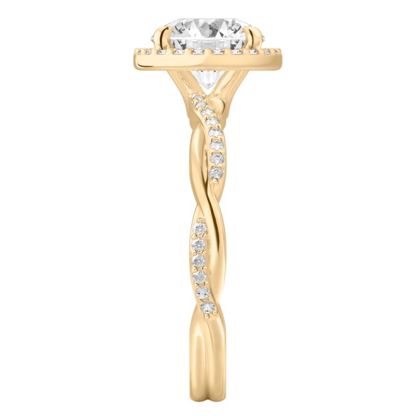 Side view of round cut diamond twist halo engagement ring in yellow gold