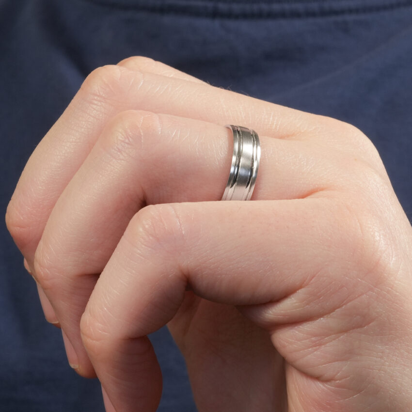 Angle view of inlay wedding band in lifestyle