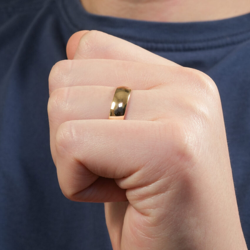 men's comfort-fit wedding band in lifestyle