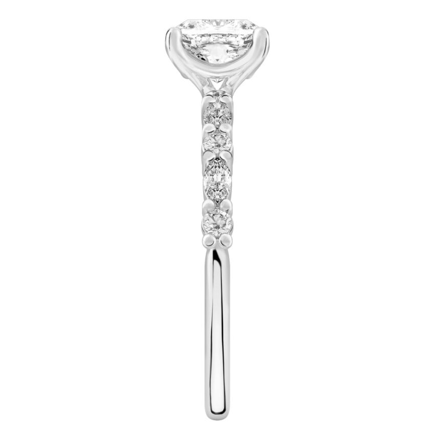 Side view of cushion cut diamond marquise and round diamond ring palladium