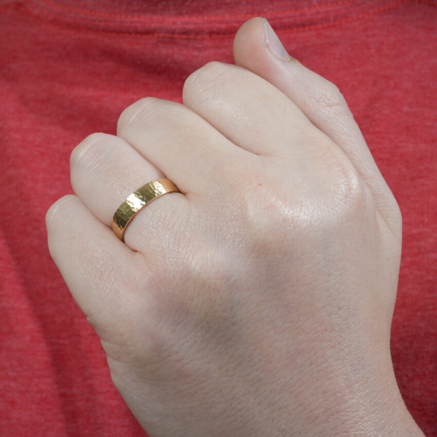 domed hammered wedding band in lifestyle