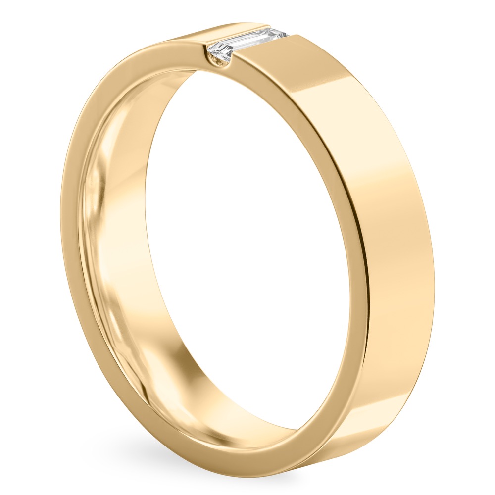 Angle view of flush baguette wedding band in yellow gold