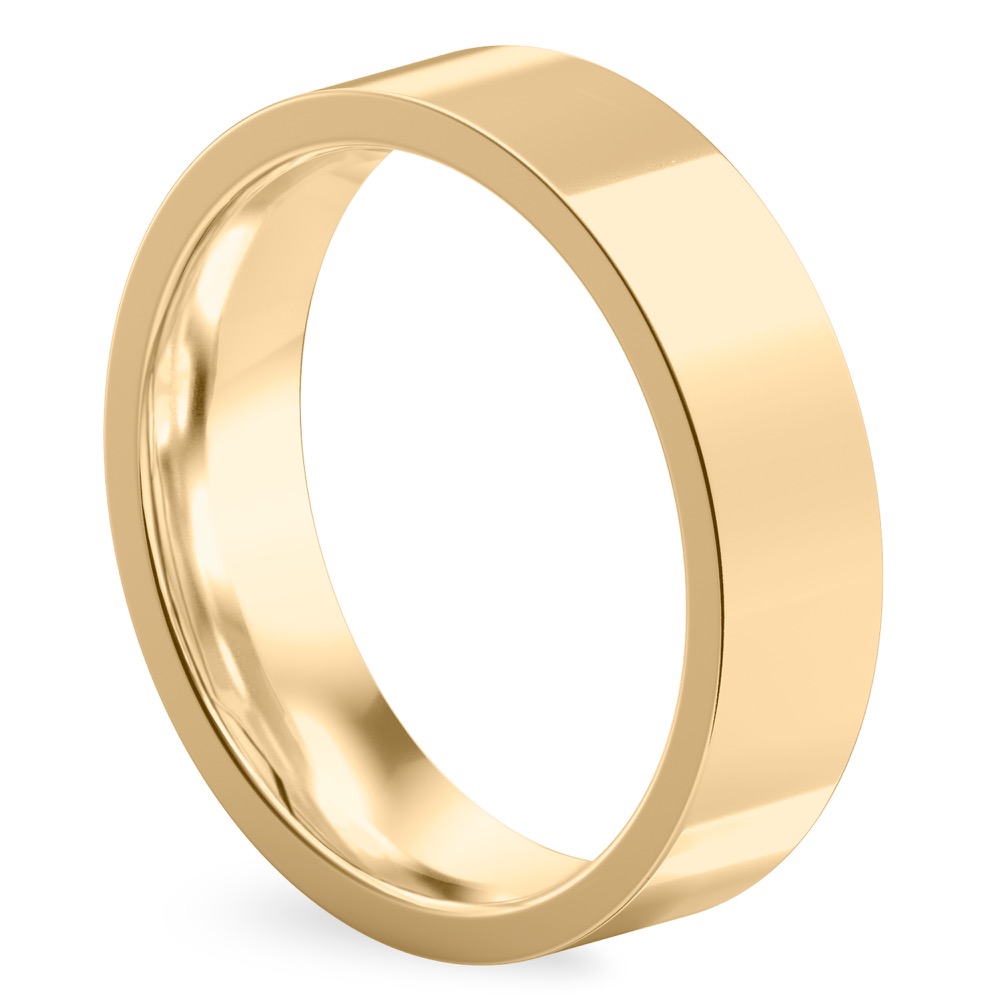 Angle view of high polish flat wedding band in yellow gold