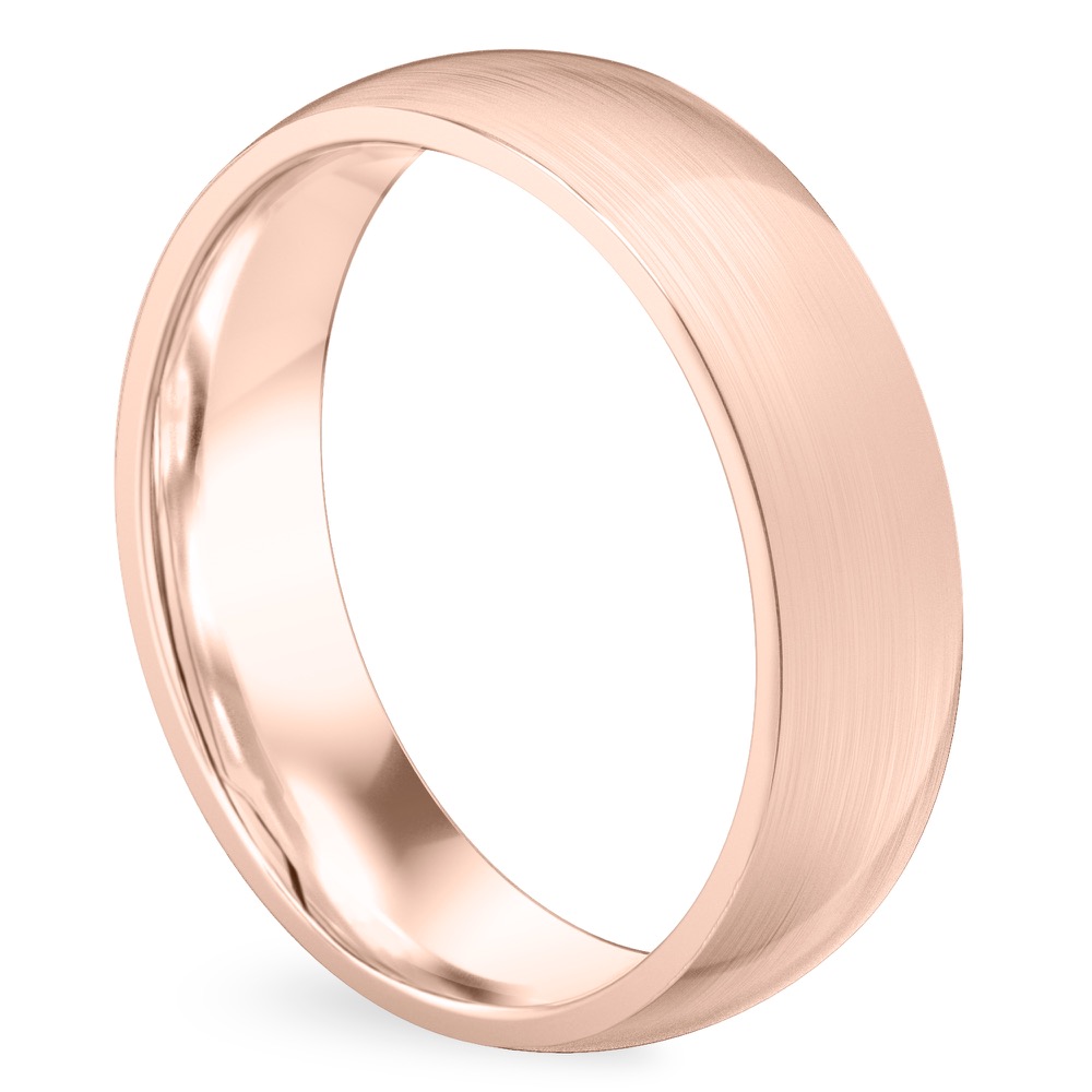 Angle view of matte wedding band in rose gold