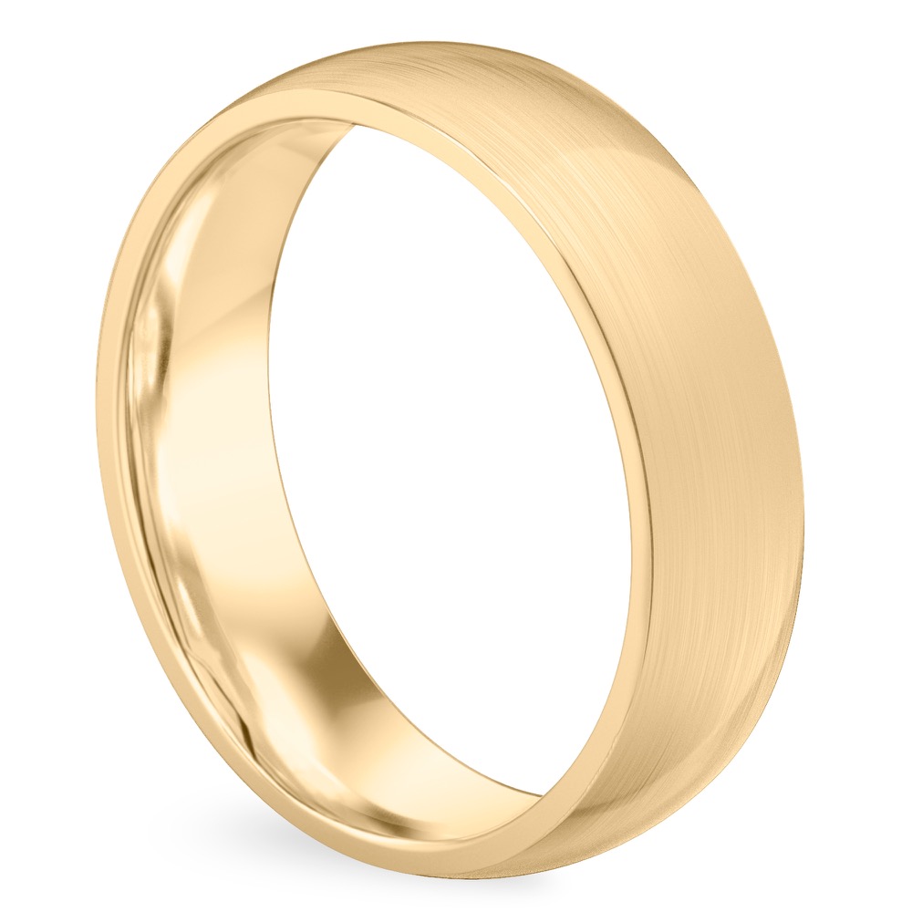 Angle view of matte wedding band in yellow gold