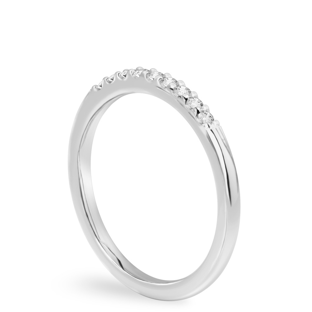 Angle view of minimalist pave wedding band in white gold