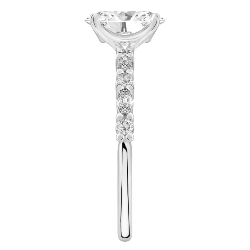 Side view of oval cut diamond marquise and round diamond ring palladium