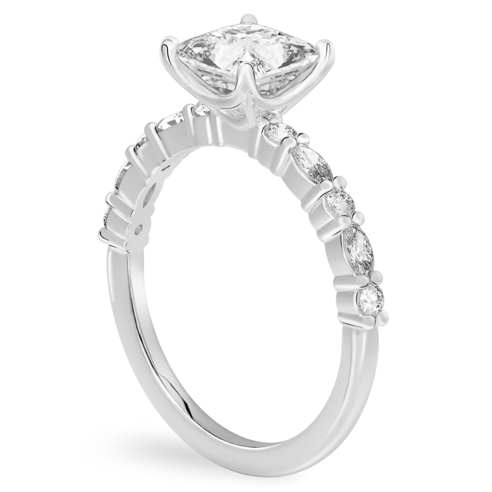 Angle view of princess cut diamond marquise and round diamond ring palladium