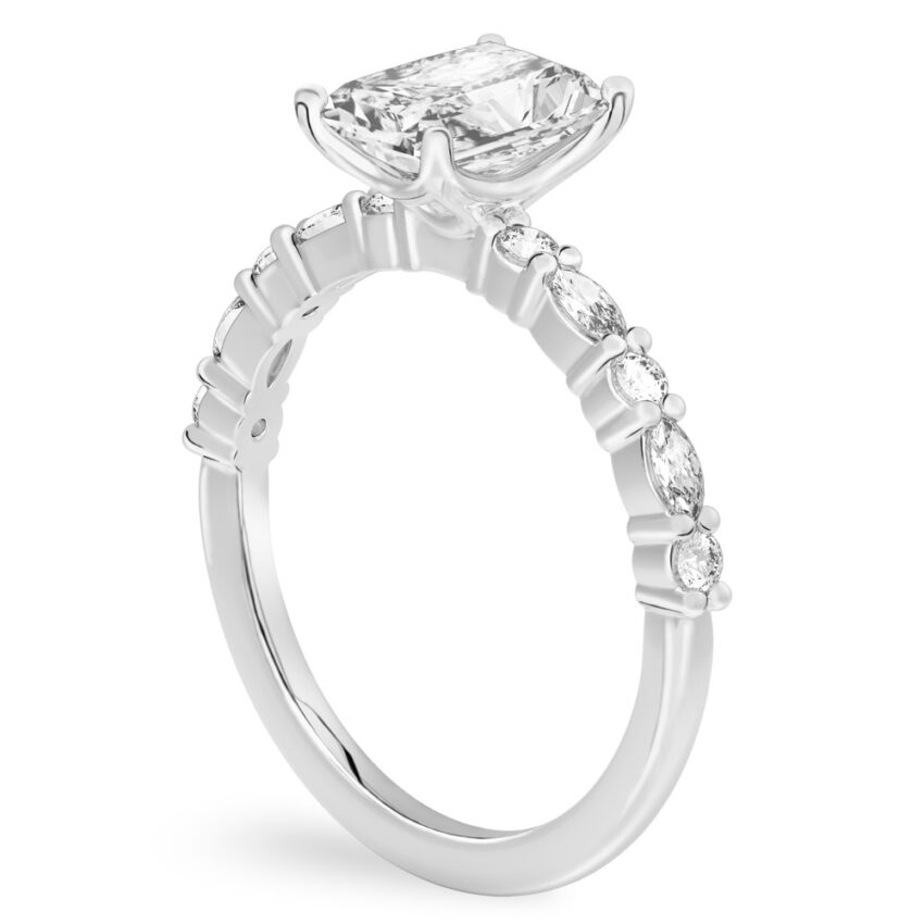 Angle view of radiant cut diamond marquise and round diamond ring palladium