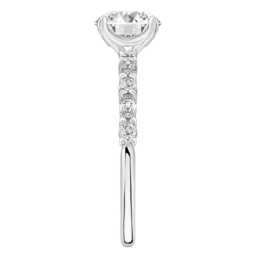 Side view of round cut diamond marquise and round diamond ring palladium