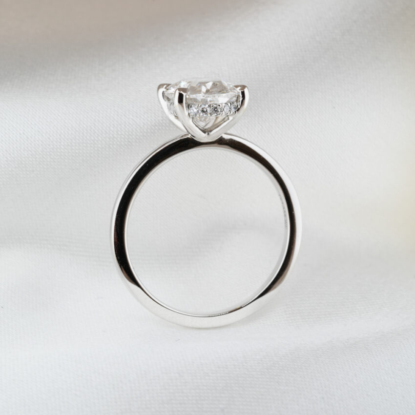 2.0 carat ultra low hidden halo engagement ring in_platinum_lifestyle_standing