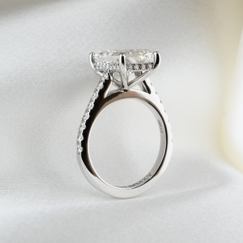 3.02 carat custom pave cathedral engagement ring in_platinum_lifestyle_standing