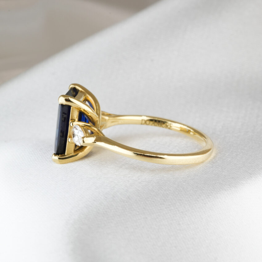 Side view of 3.50 carat pear stone engagement ring in_yellow gold_lifestyle_side